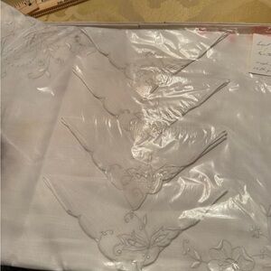 Elegant White hand Embroidered linen placemats and napkins